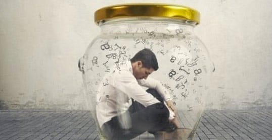 ilustrasi seorang pria di dalam sebuah wadah terkurung dalam pemikirannya