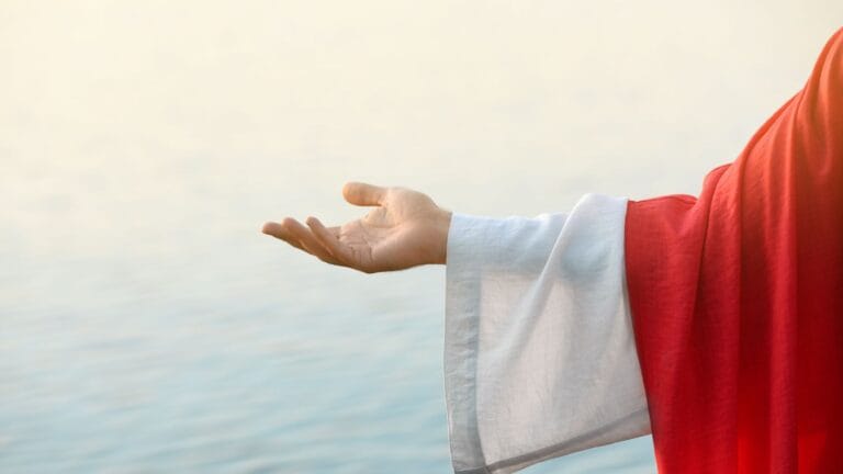 Ilustrasi close up tangan Yesus yang meraih