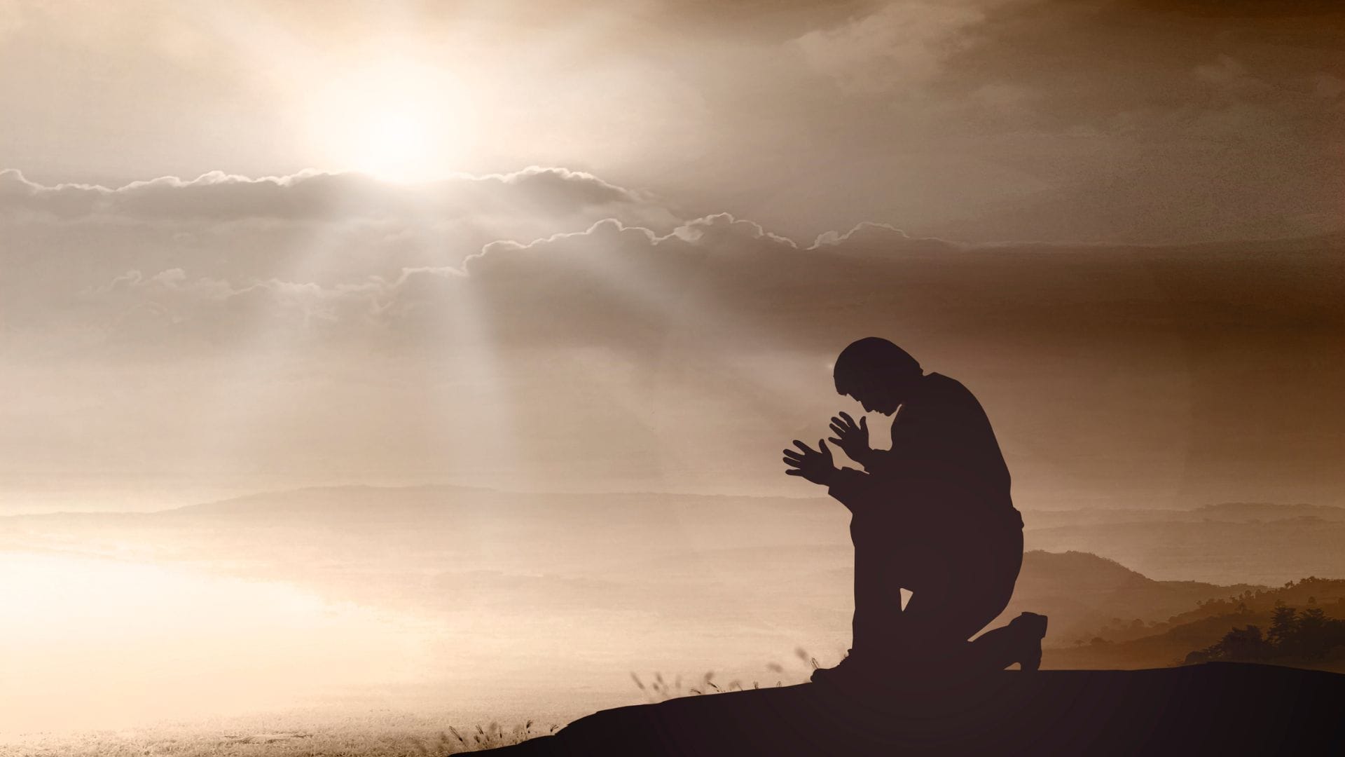 Ilustrasi seorang yang bersujud di bukit sore hari